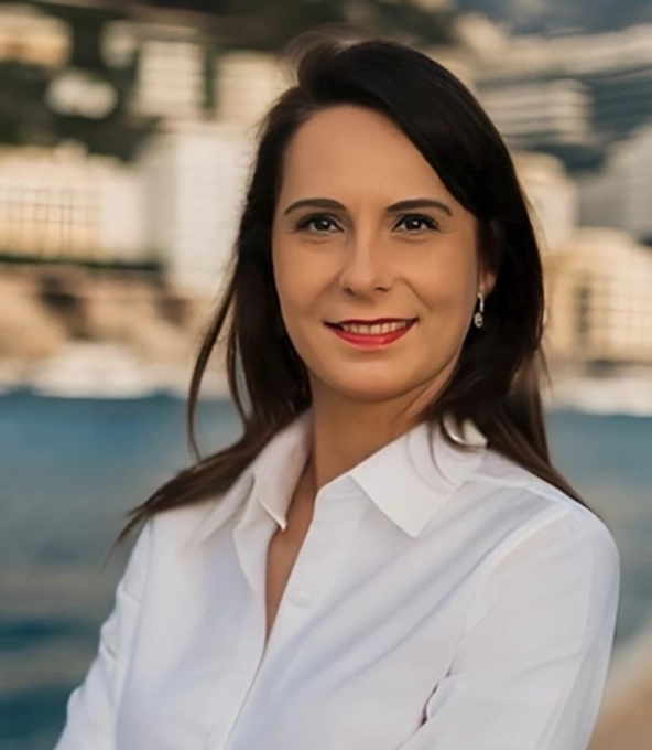 See Your Bookkeeper as a Partner | Financial Clarity for Dental Clinics | Stellar Accounts Corp Smiling business professional celebrating financial success after working with a trusted bookkeeper to organize clinic finances.