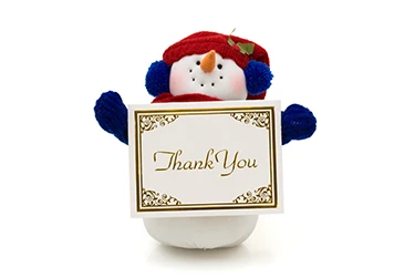 Festive Thank You Snowman Image Festive snowman holding a Thank You sign, symbolizing holiday appreciation for hardworking staff